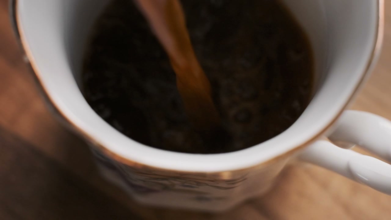 Pouring coffee